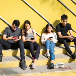 description: a group of teenagers sitting together, engrossed in their smartphones and ignoring their surroundings.