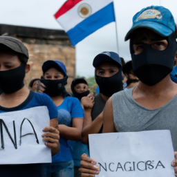 description: an image showing a group of protesters holding signs with slogans against the nicaraguan government. the protesters are wearing masks to protect their identities.
