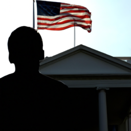 description: a silhouette of a person standing in front of the white house, looking up at the american flag waving in the wind.