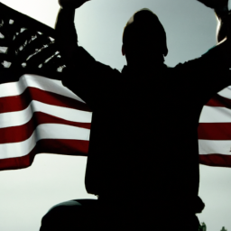 Description: A silhouette of a person standing in front of the American flag with their hands raised.