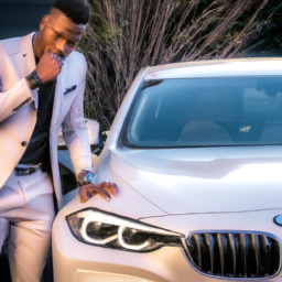 description: a well-dressed man with a distinct voice and charismatic presence stands next to a sleek bmw car, giving off an air of sophistication and allure. his eyes sparkle with mischief as he captivates the audience with his unique charm.